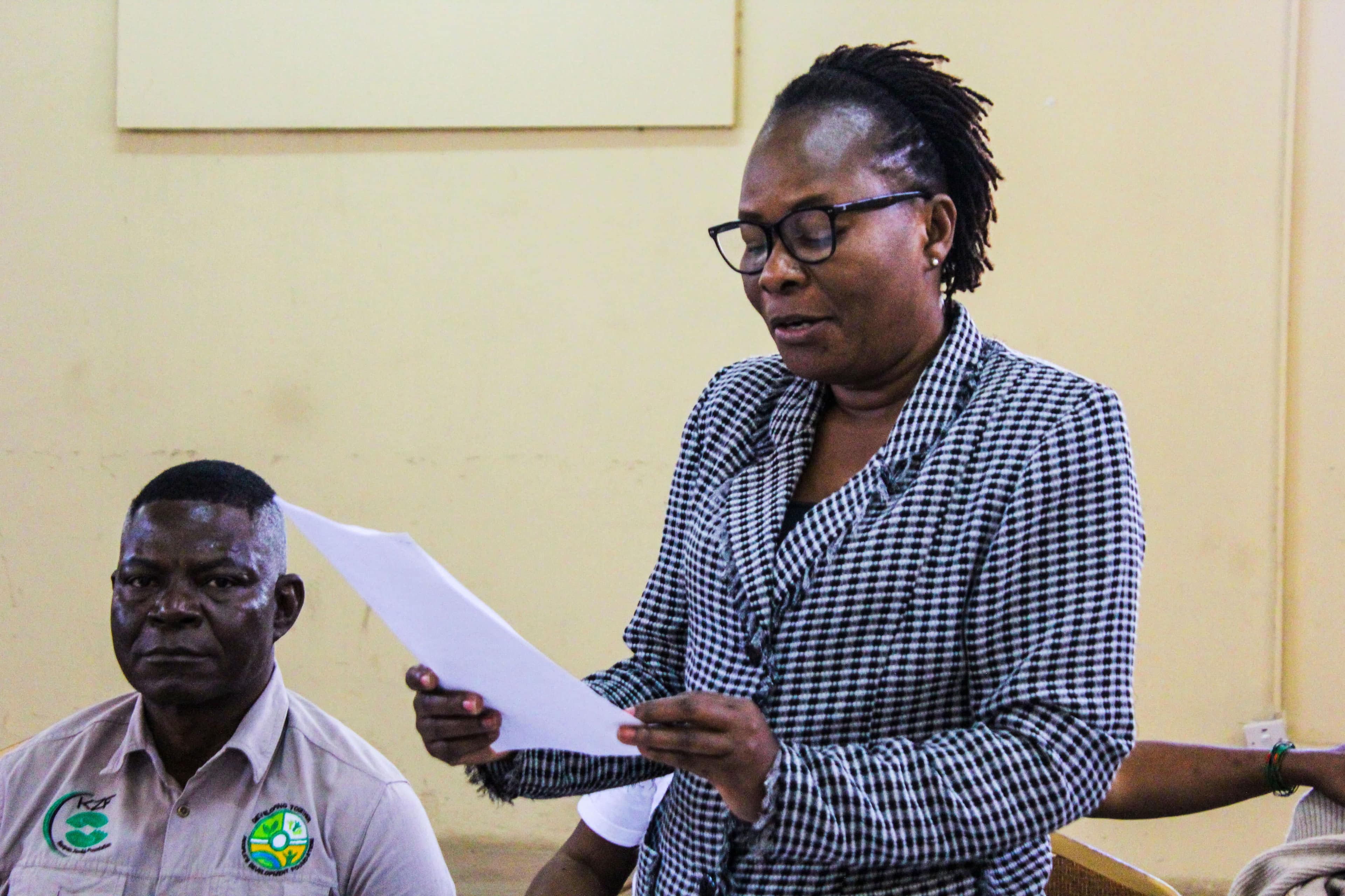 Mrs. Hope Chiposo reads a speech.