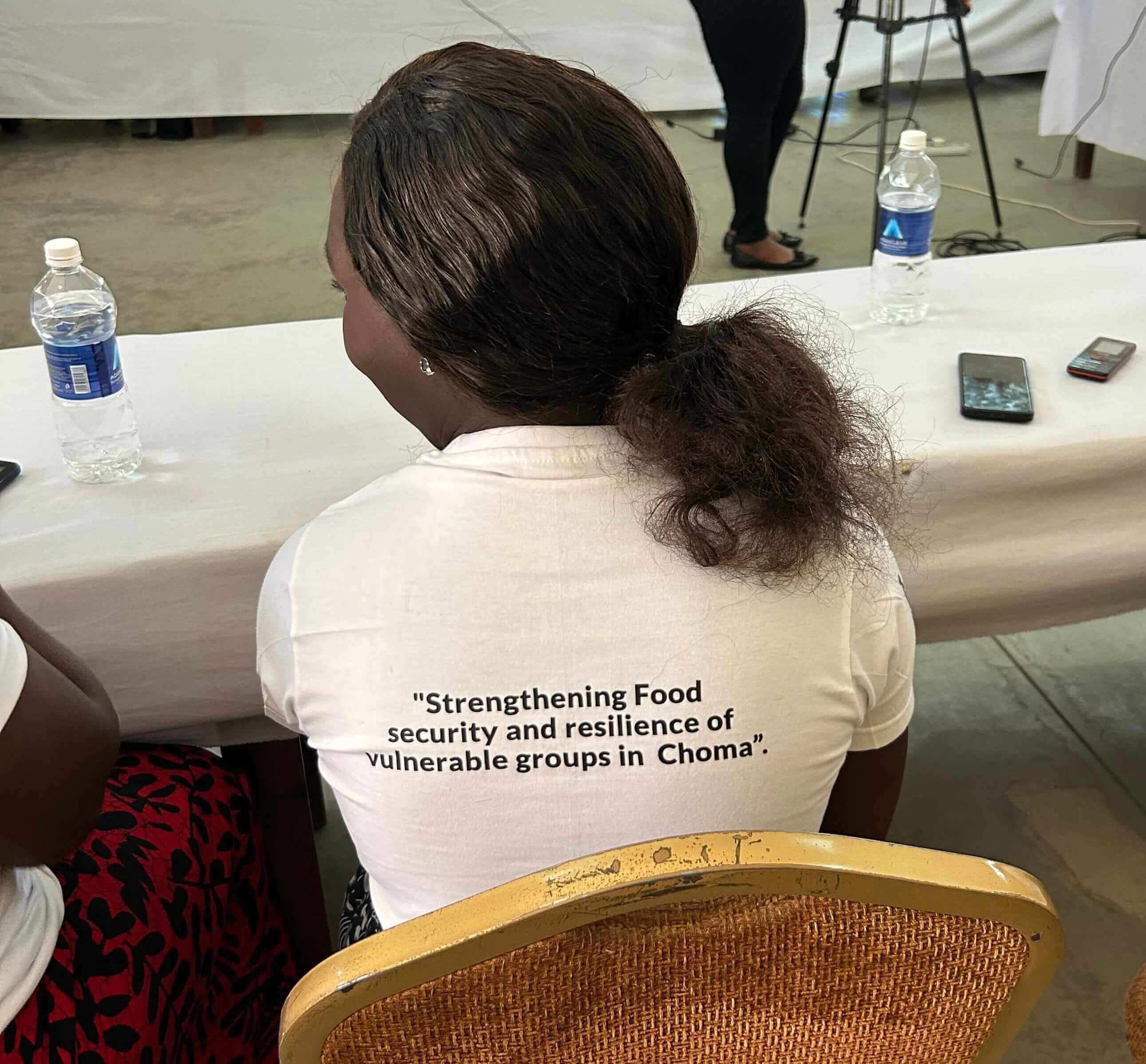 Participant wearing a project launch shirt.